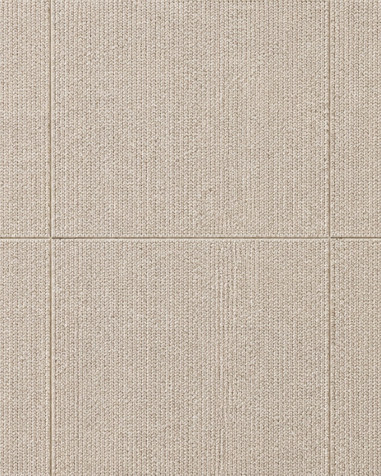 Close detail of woven carpet tile, the joints between tiles just visible
