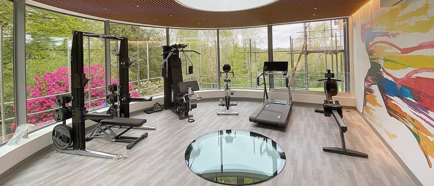A fitness suite with a resilient floor running wall to wall